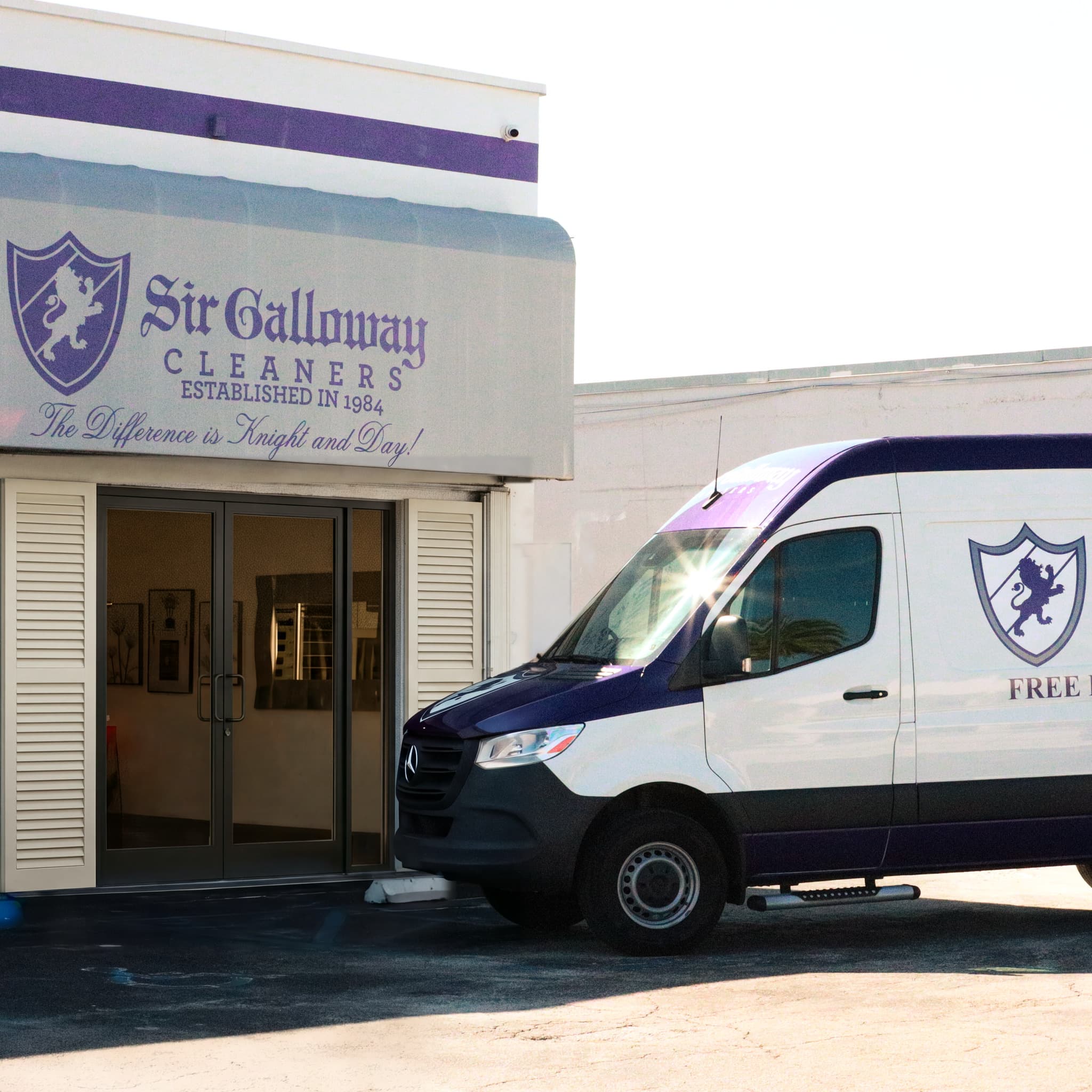 A Sir Galloway delivery van parked at the entrance, beneath the crested awning reading Established in 1984.